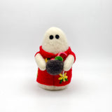 Hand felted small white ghost in a red Hawaiian style shirt holding a coconut cocktail
